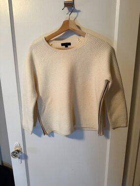 J Crew oatmeal boiled wool cropped sweater with side-seam zippers.